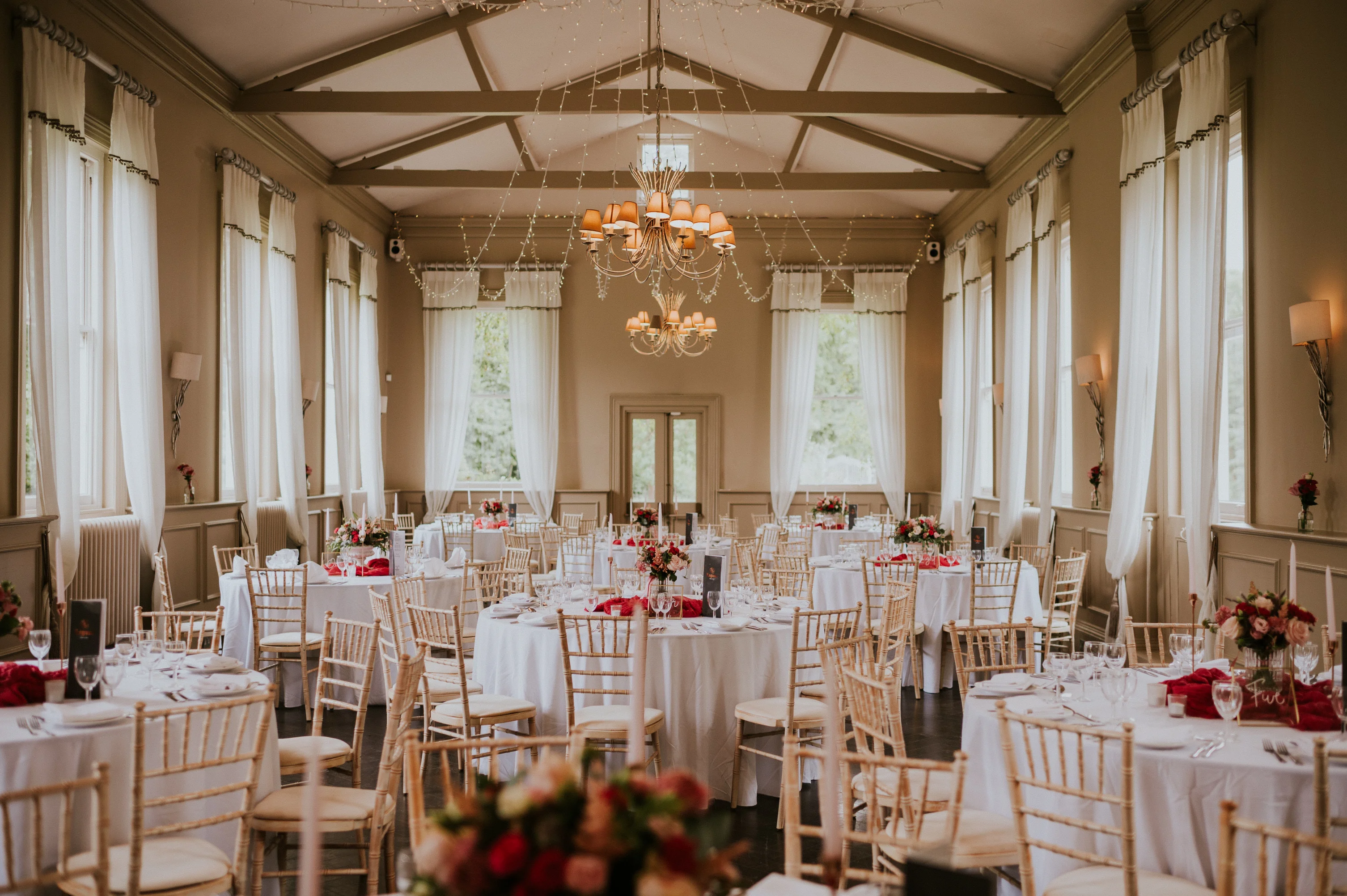 Beautifully decorated wedding venue with floral arrangements